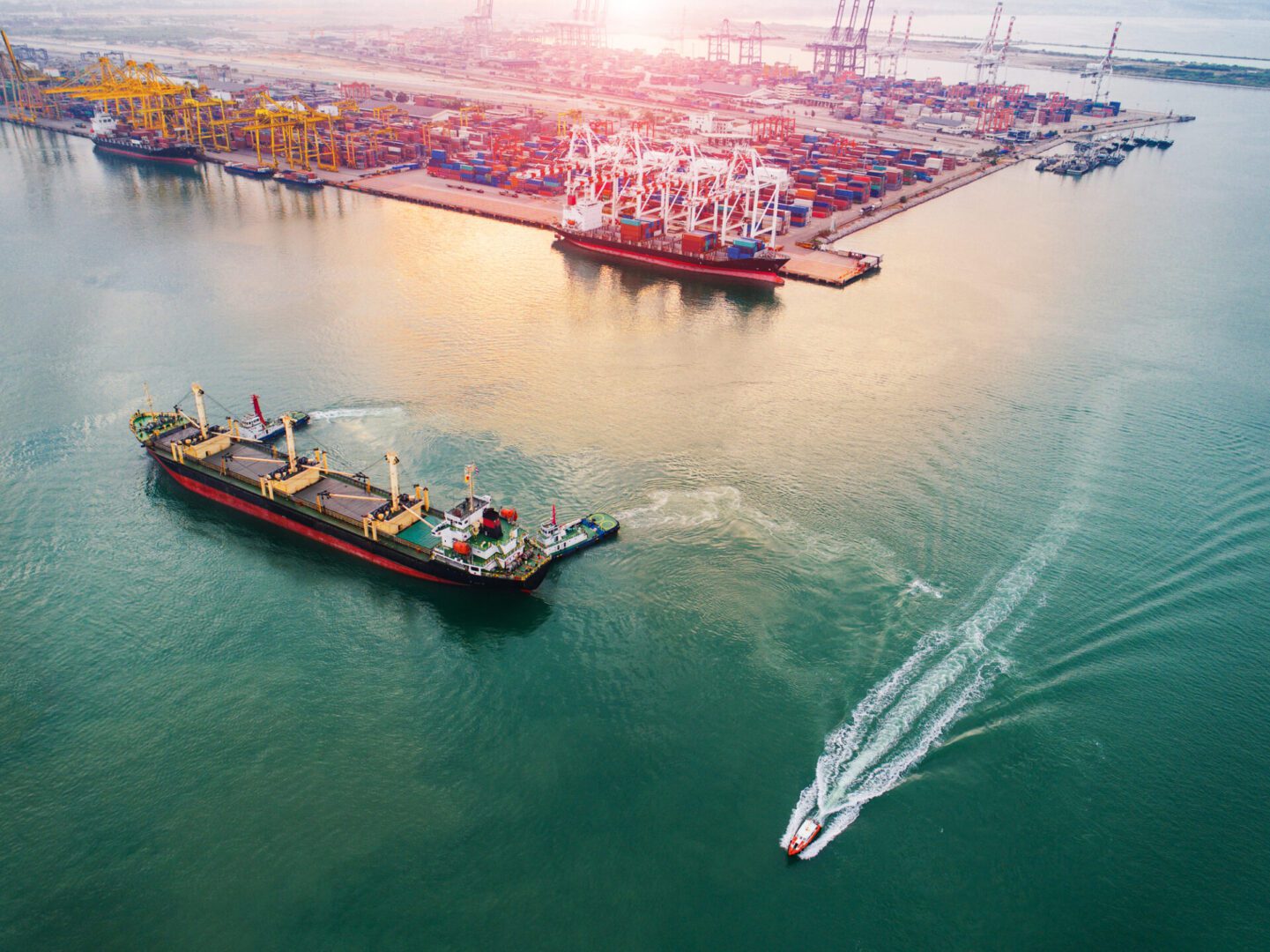 Cargo ship near busy container port.